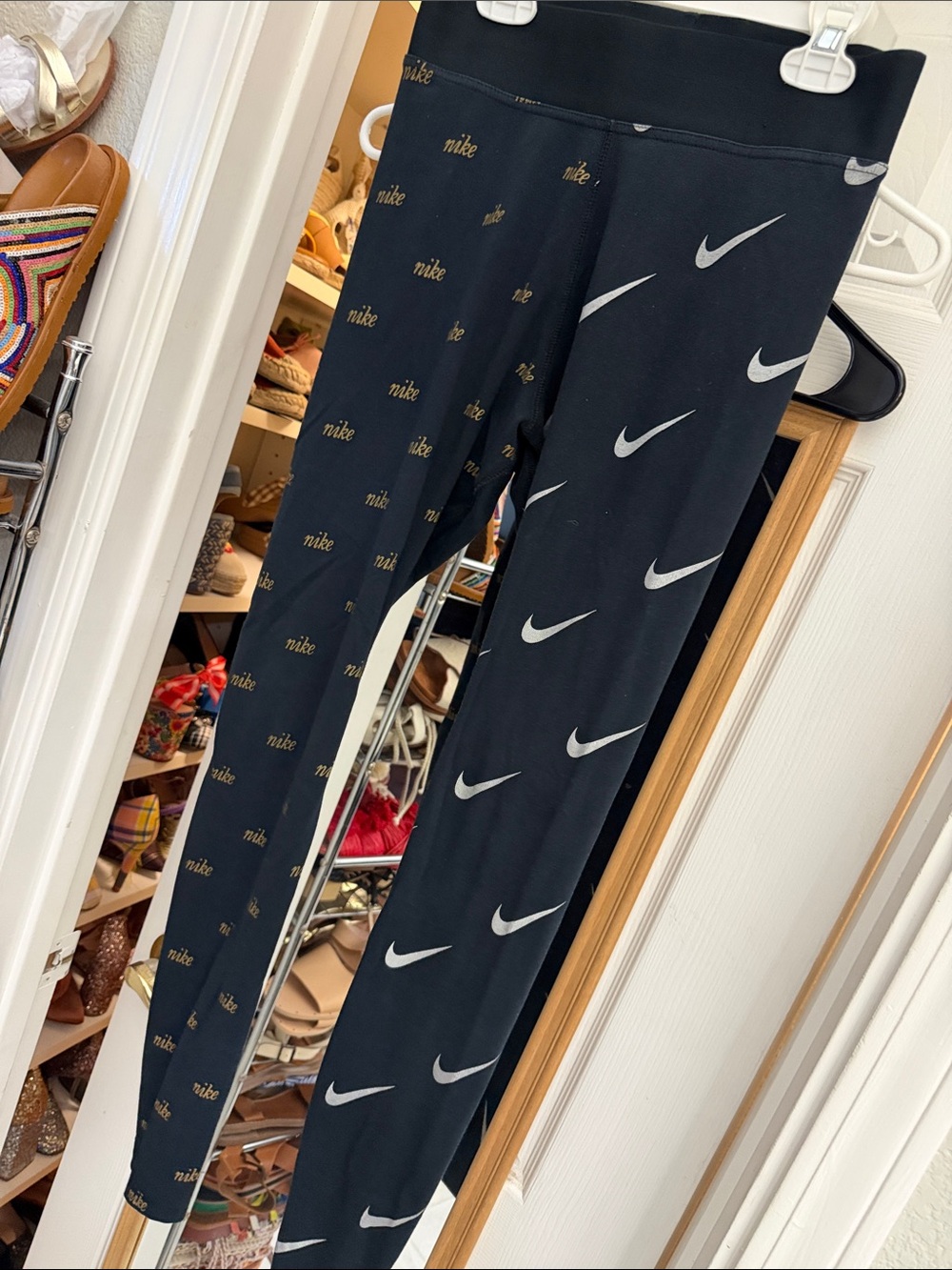Nike Black Leggings with White Swoosh and Gold Logo Print